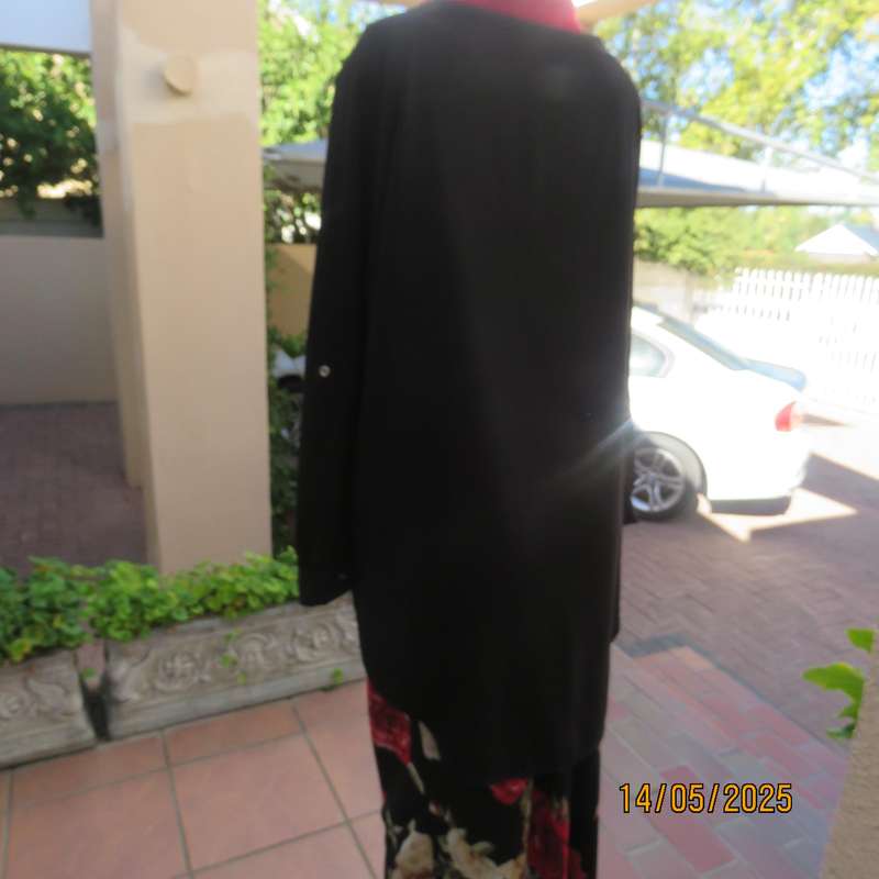 Very black AMARA long raglan sleeve button down textured polyester top. Size 46