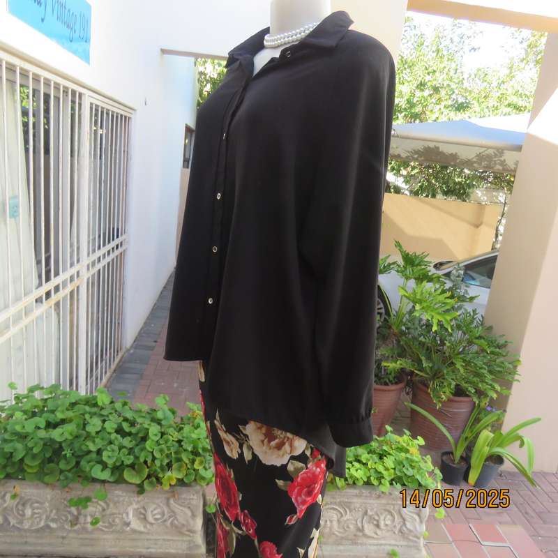 Very black AMARA long raglan sleeve button down textured polyester top. Size 46