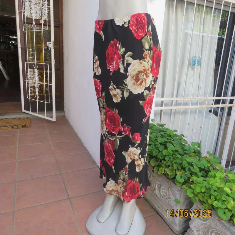 MASSUMI black ankle length fully lined skirt with bold red and cream flowers. Size 38