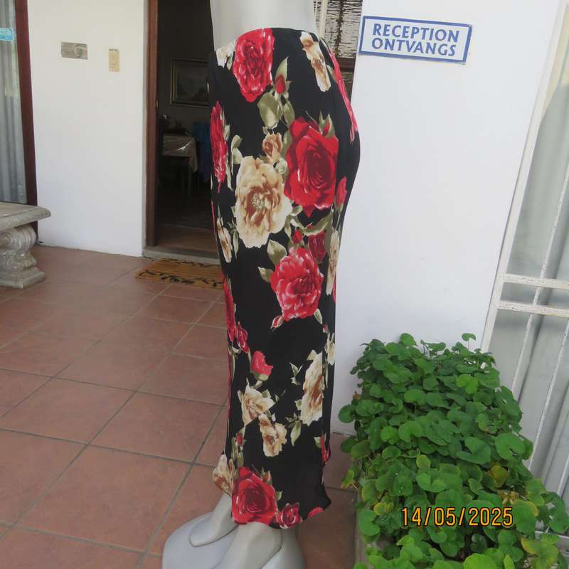 MASSUMI black ankle length fully lined skirt with bold red and cream flowers. Size 38