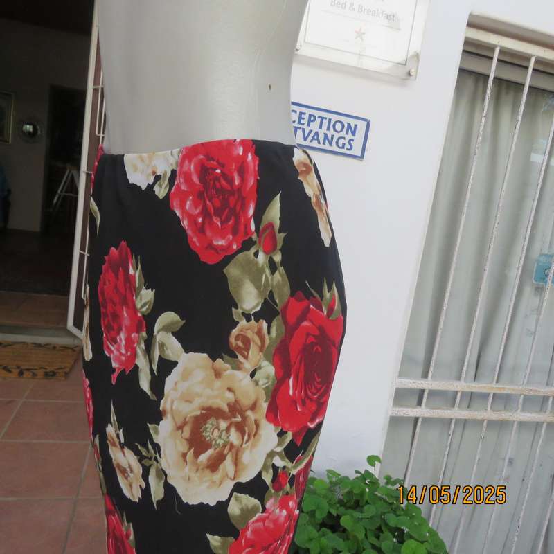 MASSUMI black ankle length fully lined skirt with bold red and cream flowers. Size 38