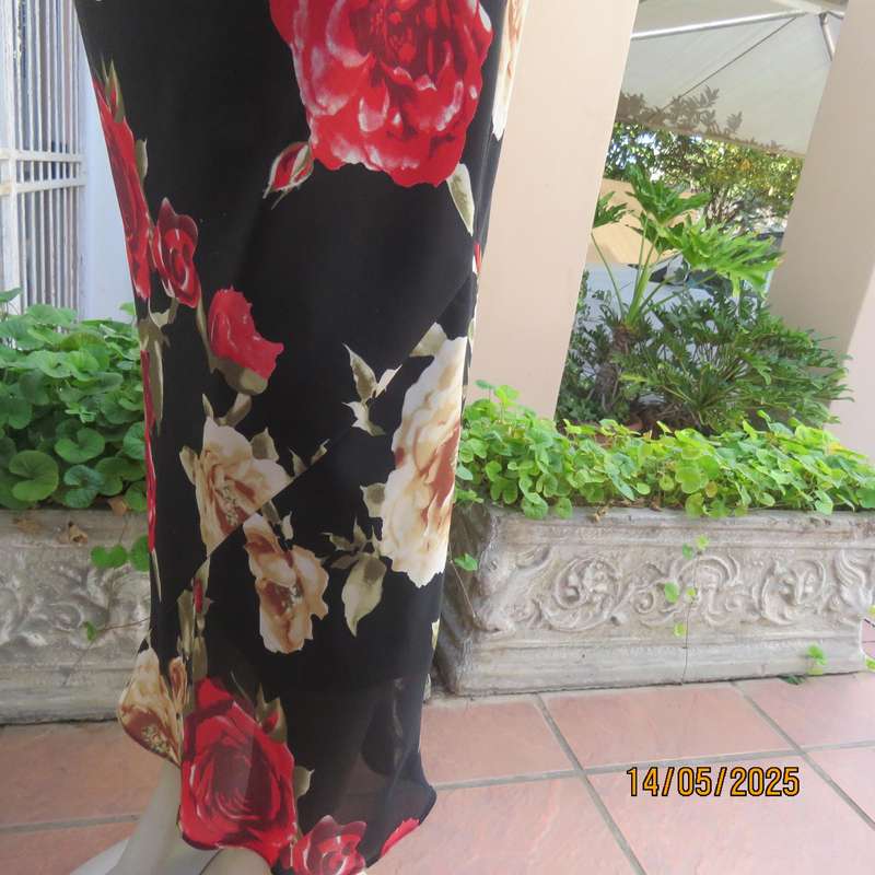 MASSUMI black ankle length fully lined skirt with bold red and cream flowers. Size 38