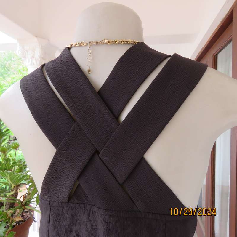 Beautiful black sleek button down ankle length dress by CHARLOTTE size 36. Criss cross strap back.