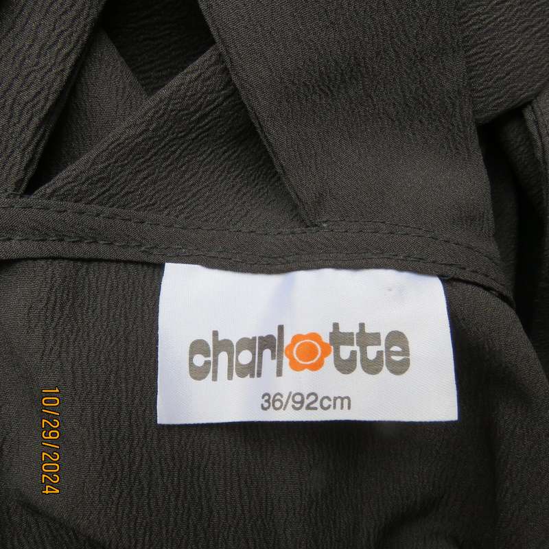 Beautiful black sleek button down ankle length dress by CHARLOTTE size 36. Criss cross strap back.