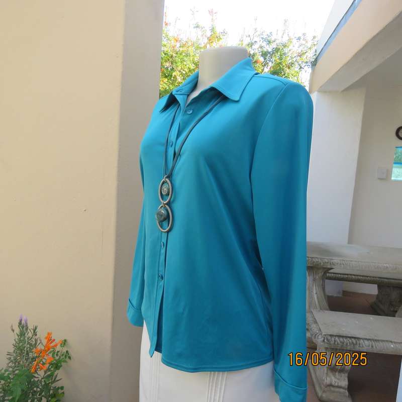 WOOLWORTHS long sleeve jade stretch polyester button down top. Size 36