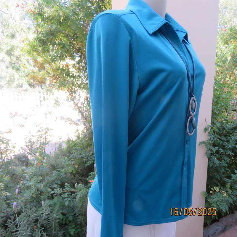 WOOLWORTHS long sleeve jade stretch polyester button down top. Size 36