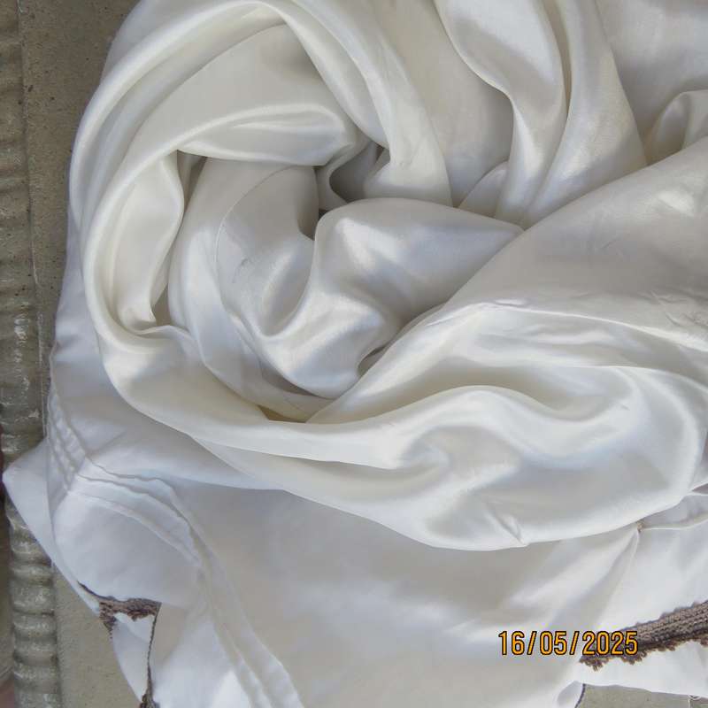 Ankle length light cream polycotton tiered bandless skirt. Tucking and lace decoration. Size 34