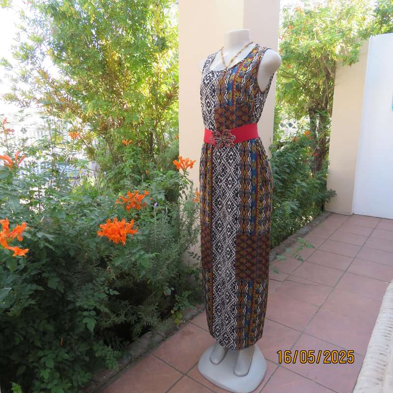 Ethnic patterned maxi polyester sleeveless dress. Elasticated waist. Size 34.
