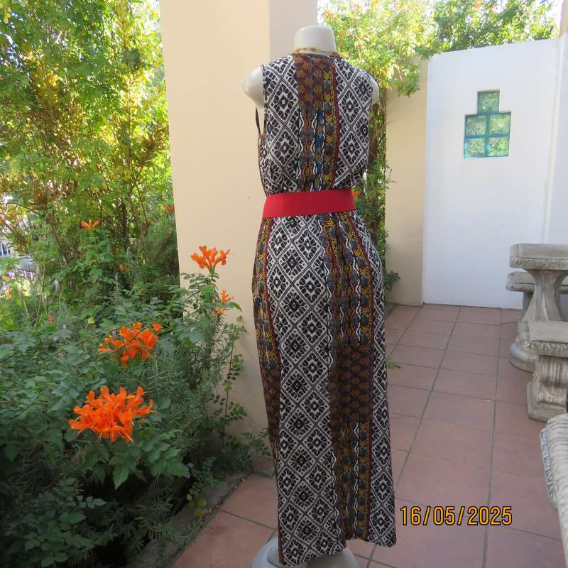 Ethnic patterned maxi polyester sleeveless dress. Elasticated waist. Size 34.