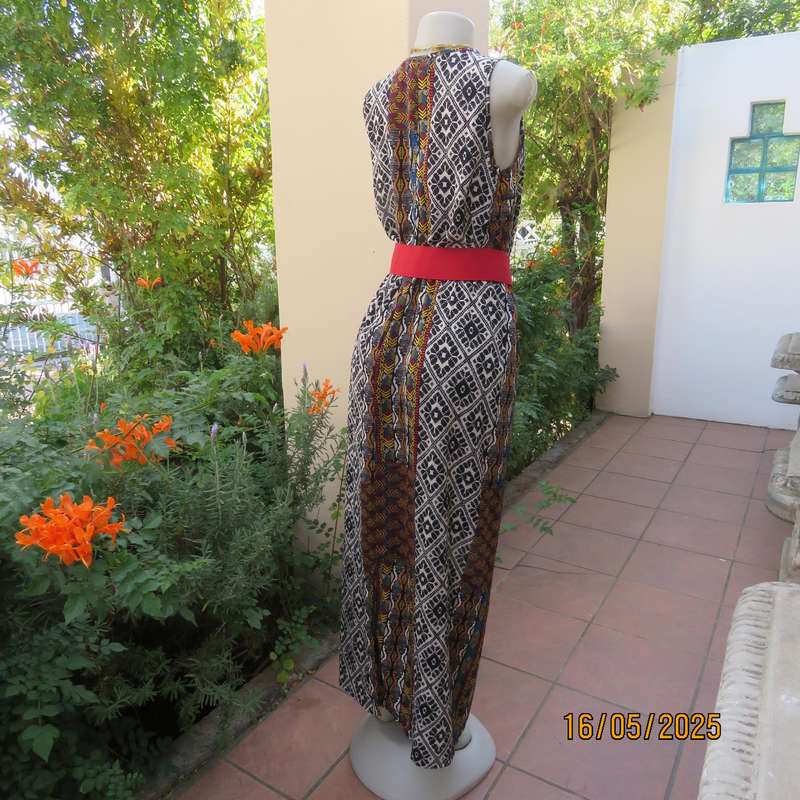 Ethnic patterned maxi polyester sleeveless dress. Elasticated waist. Size 34.