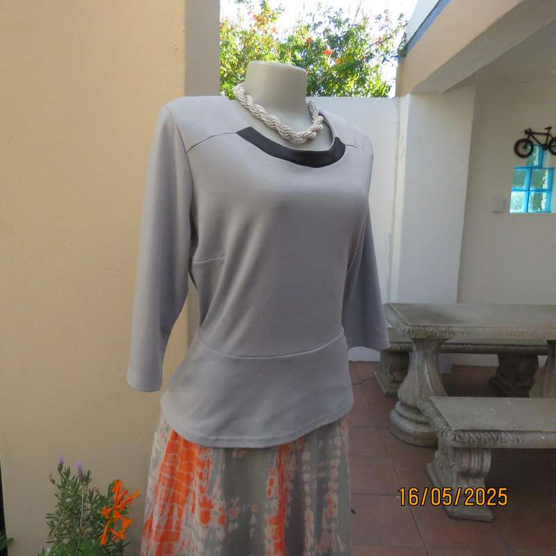 FASHION EXPRESS smoky grey polyester peplum style top size 38.