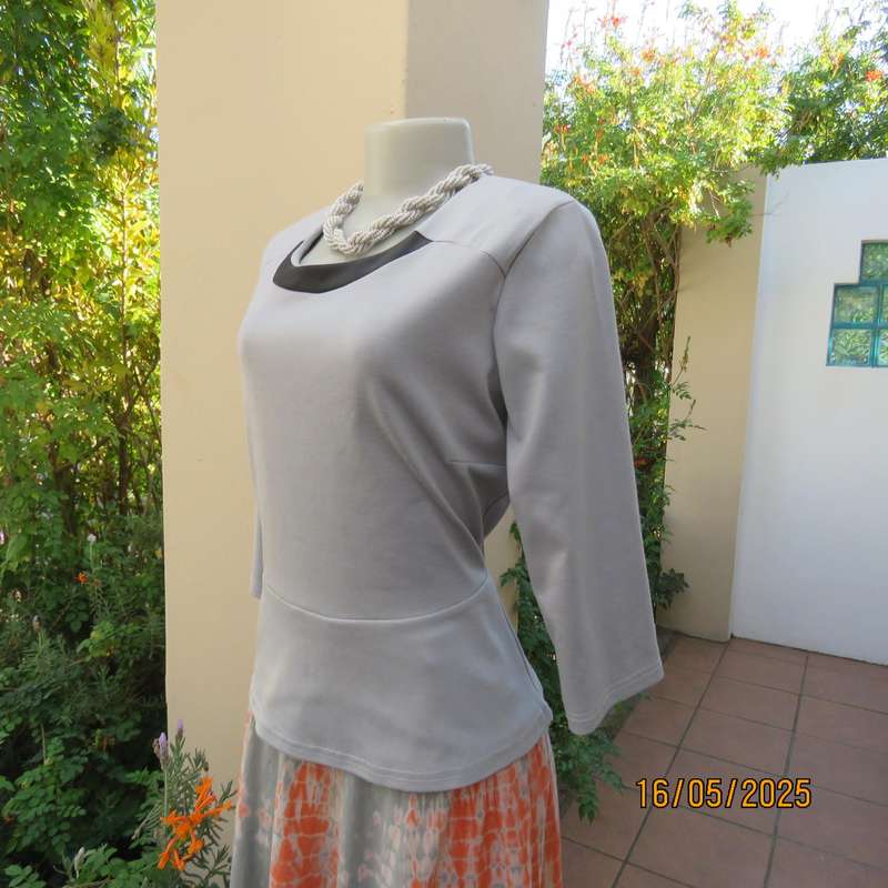 FASHION EXPRESS smoky grey polyester peplum style top size 38.