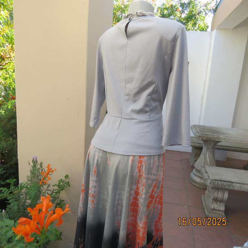 FASHION EXPRESS smoky grey polyester peplum style top size 38.