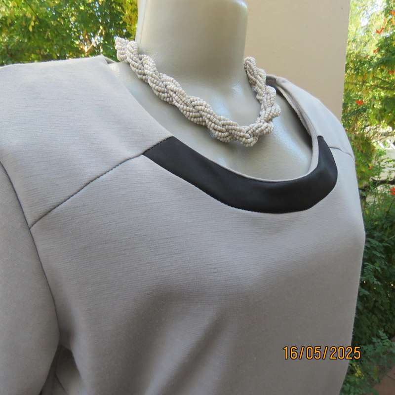 FASHION EXPRESS smoky grey polyester peplum style top size 38.
