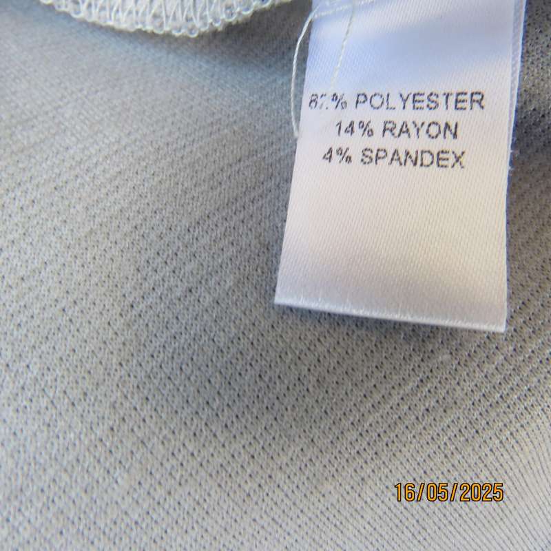 FASHION EXPRESS smoky grey polyester peplum style top size 38.
