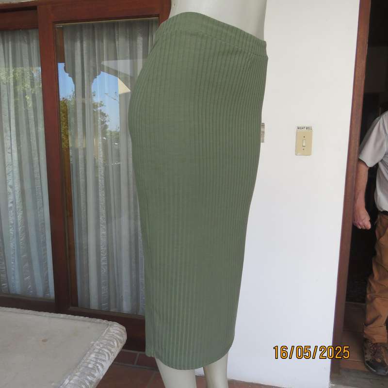 IQ olive green ribbed polyester bodycon low calf length skirt. Size 34