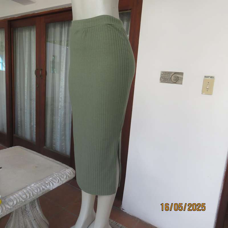 IQ olive green ribbed polyester bodycon low calf length skirt. Size 34
