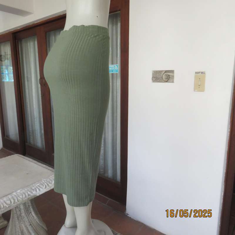 IQ olive green ribbed polyester bodycon low calf length skirt. Size 34