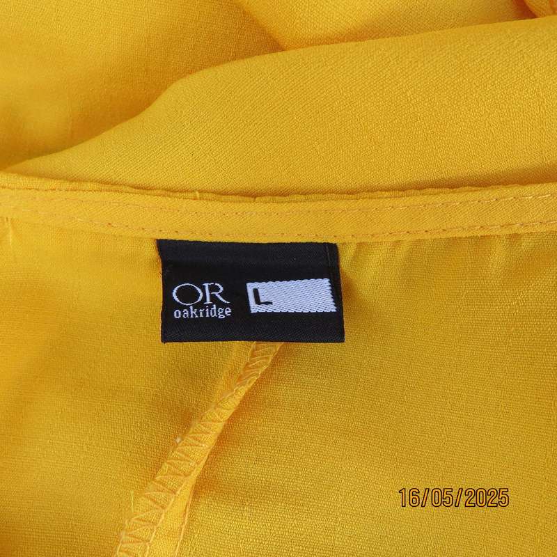 Butterscotch yellow polyester slip over size 38 top. Tiny cut-on sleeves.