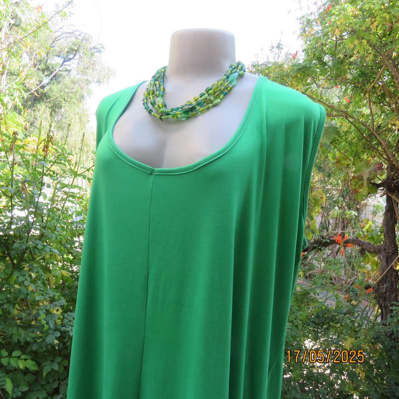 Shamrock green slip over size 46-48 shift dress. Slit on front. Polyester stretch