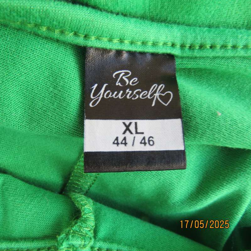 Shamrock green slip over size 46-48 shift dress. Slit on front. Polyester stretch