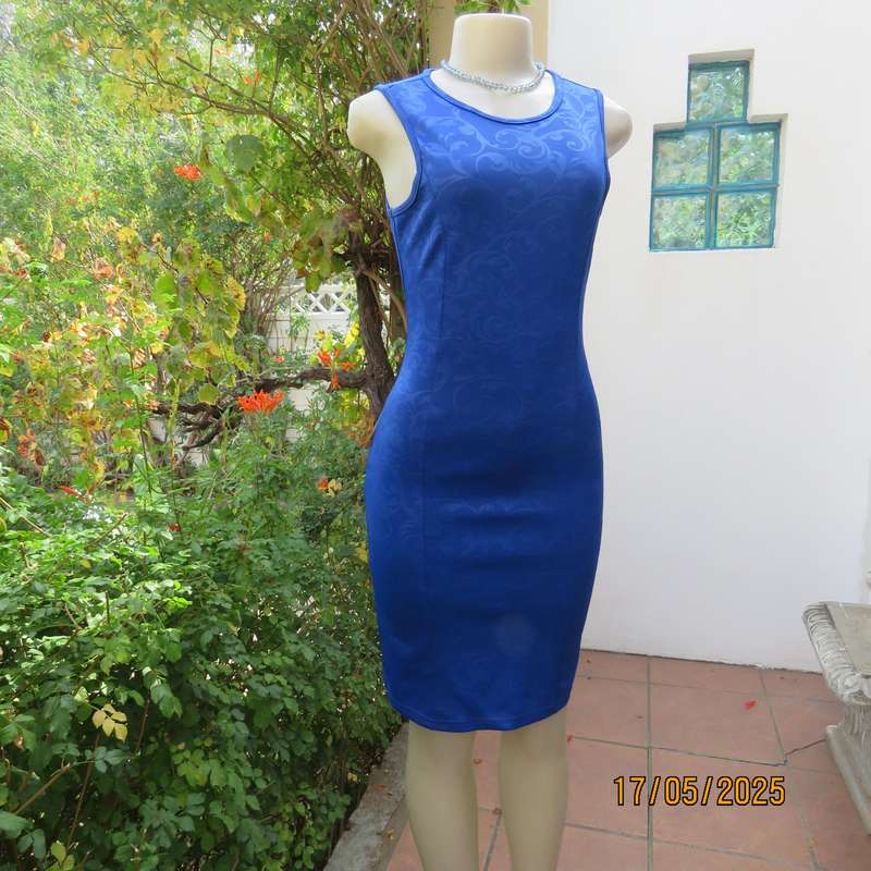 Royal blue bodycon stretch heavy embossed polyester dress. Size 32. Zip at back.