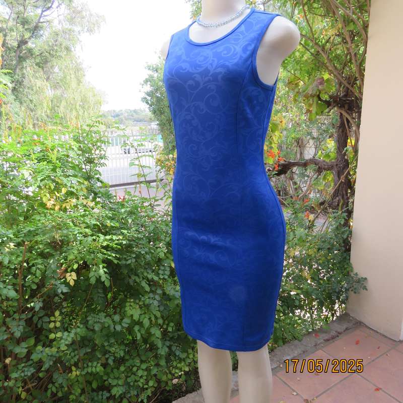 Royal blue bodycon stretch heavy embossed polyester dress. Size 32. Zip at back.