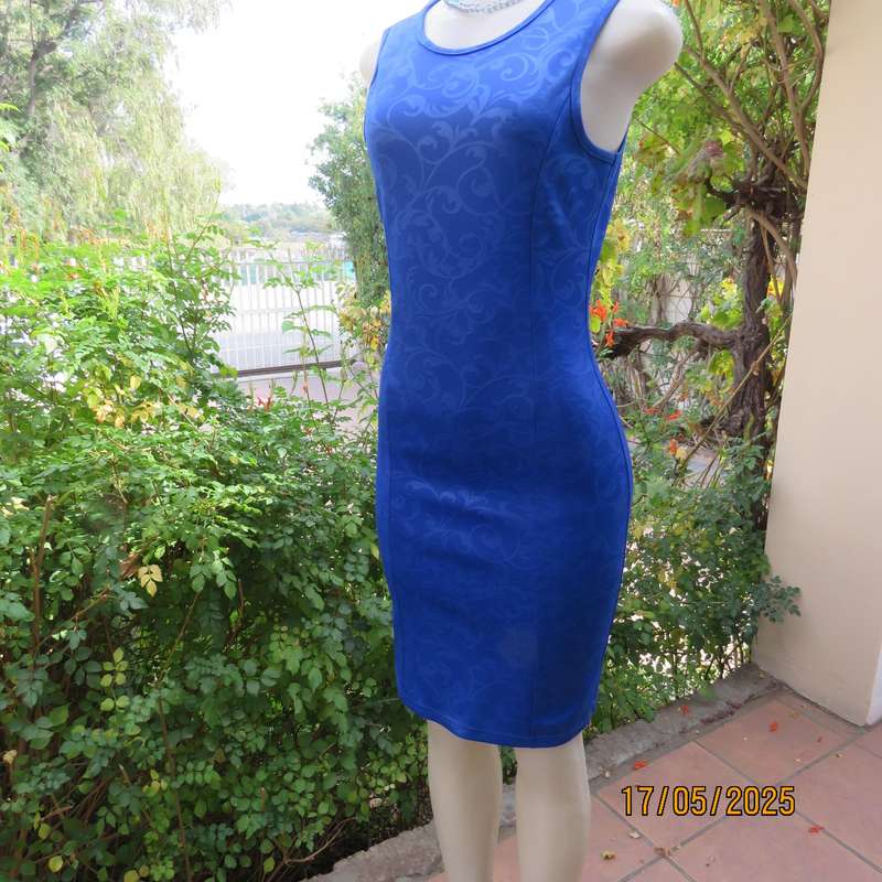Royal blue bodycon stretch heavy embossed polyester dress. Size 32. Zip at back.