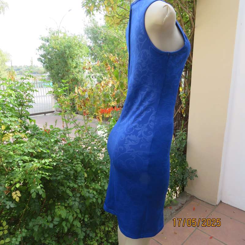 Royal blue bodycon stretch heavy embossed polyester dress. Size 32. Zip at back.