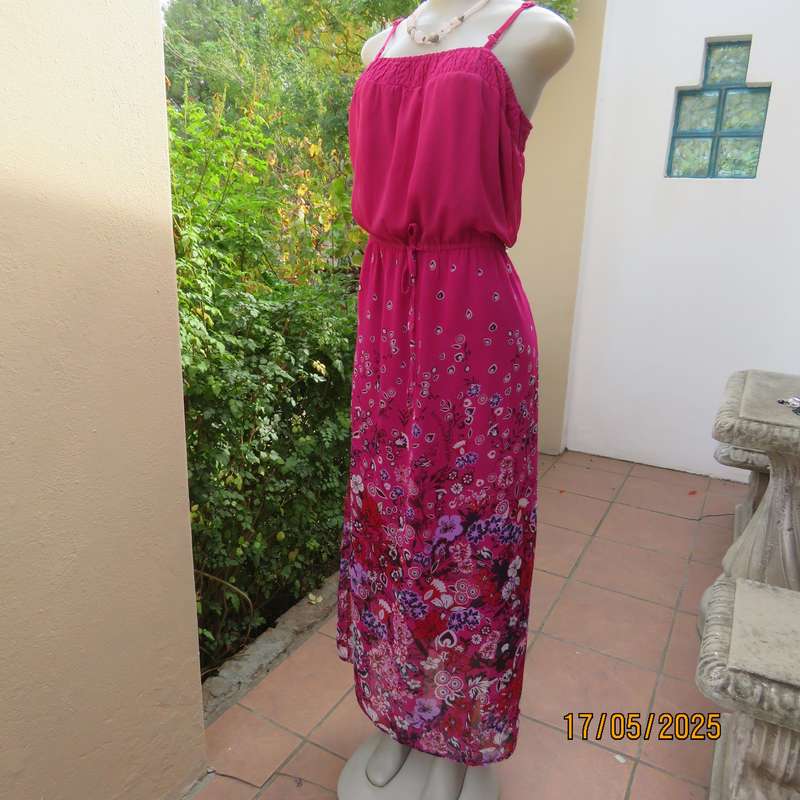 A WOMAN long punch pink fully lined sheer polyester dress. Size 40-42. Floral border