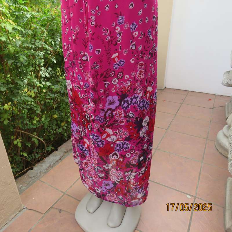 A WOMAN long punch pink fully lined sheer polyester dress. Size 40-42. Floral border