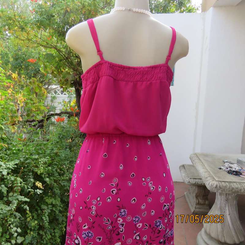 A WOMAN long punch pink fully lined sheer polyester dress. Size 40-42. Floral border