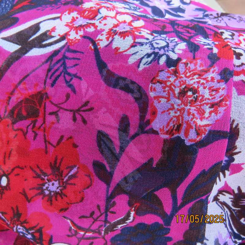 A WOMAN long punch pink fully lined sheer polyester dress. Size 40-42. Floral border