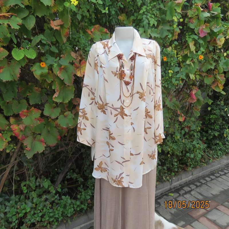 PENNY C rich cream with brown floral pattern long sleeve top. Size 48-50