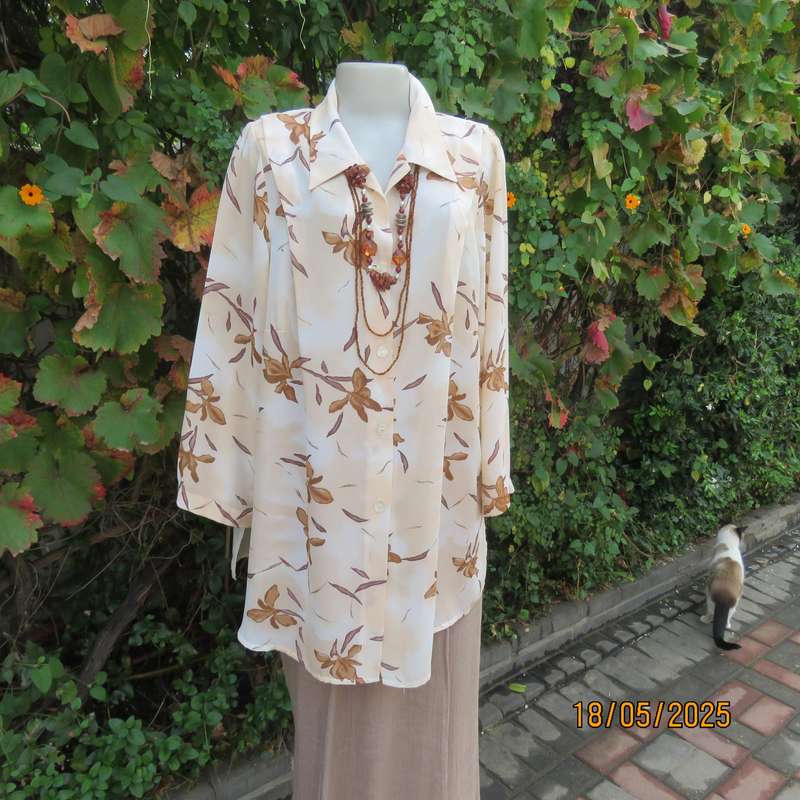 PENNY C rich cream with brown floral pattern long sleeve top. Size 48-50