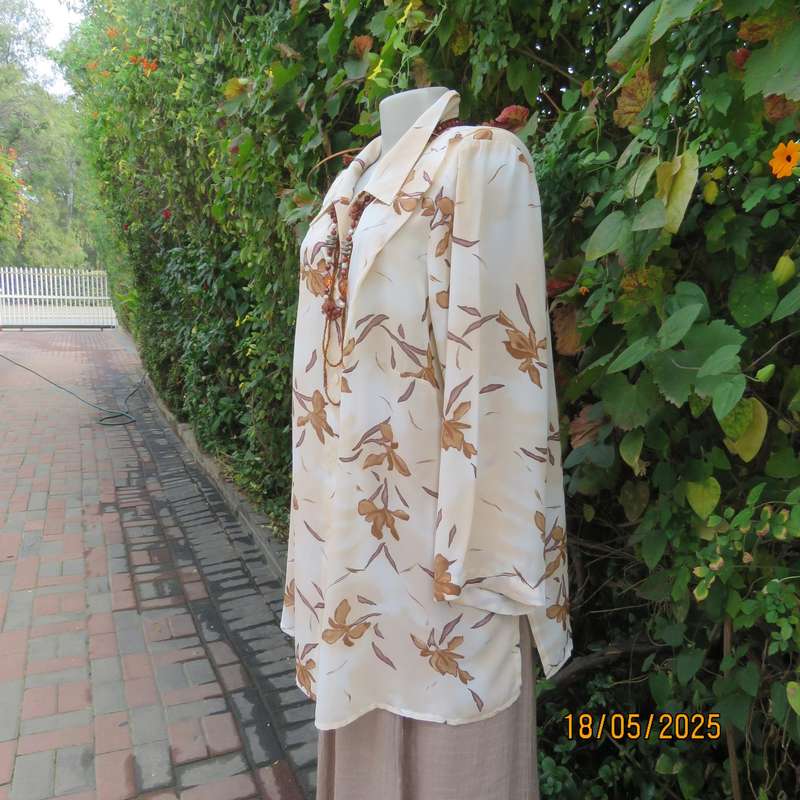 PENNY C rich cream with brown floral pattern long sleeve top. Size 48-50