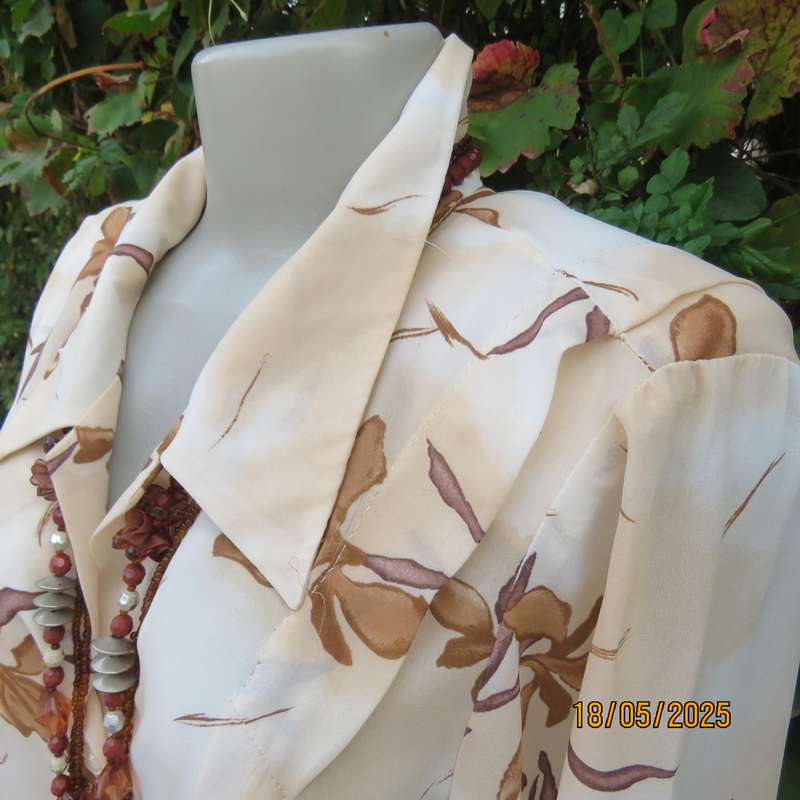 PENNY C rich cream with brown floral pattern long sleeve top. Size 48-50