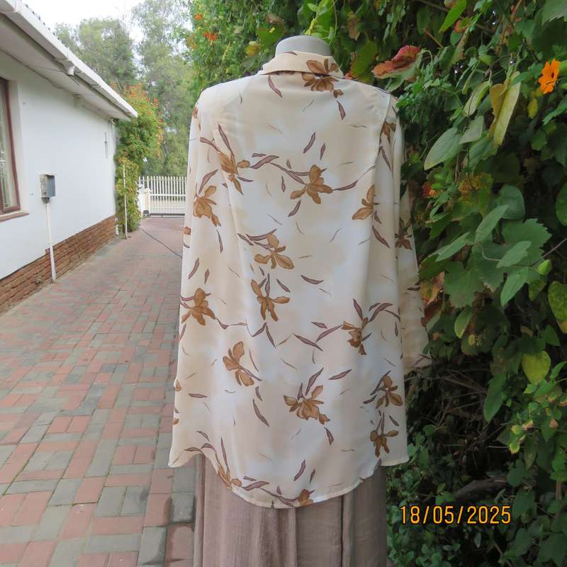 PENNY C rich cream with brown floral pattern long sleeve top. Size 48-50