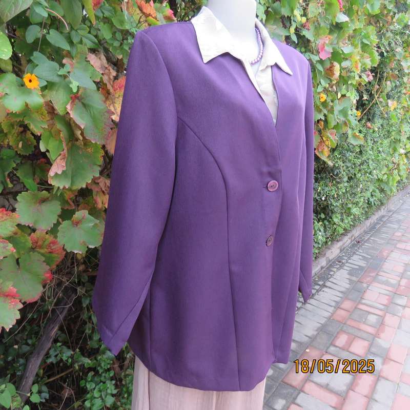 Dark purple boutique made long sleeve elegant partly lined collarless jacket. Size 42-44
