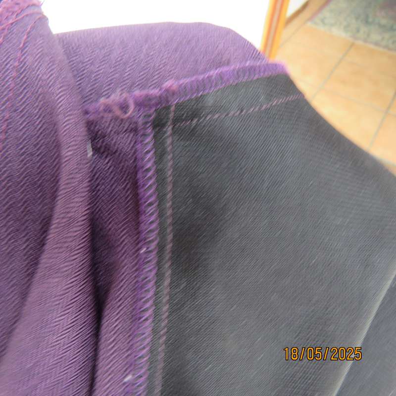 Dark purple boutique made long sleeve elegant partly lined collarless jacket. Size 42-44