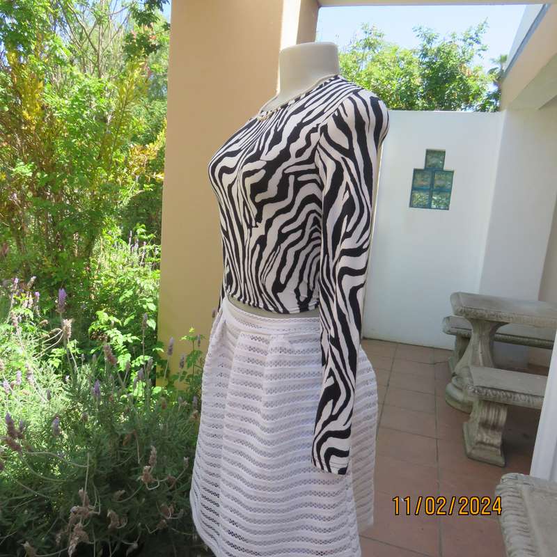 Sexy petite zebra stripe black-white long sleeve stretch polyester size 28-4 top by SHEIN.As new