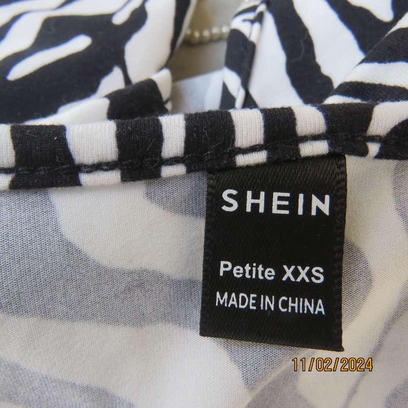 Sexy petite zebra stripe black-white long sleeve stretch polyester size 28-4 top by SHEIN.As new