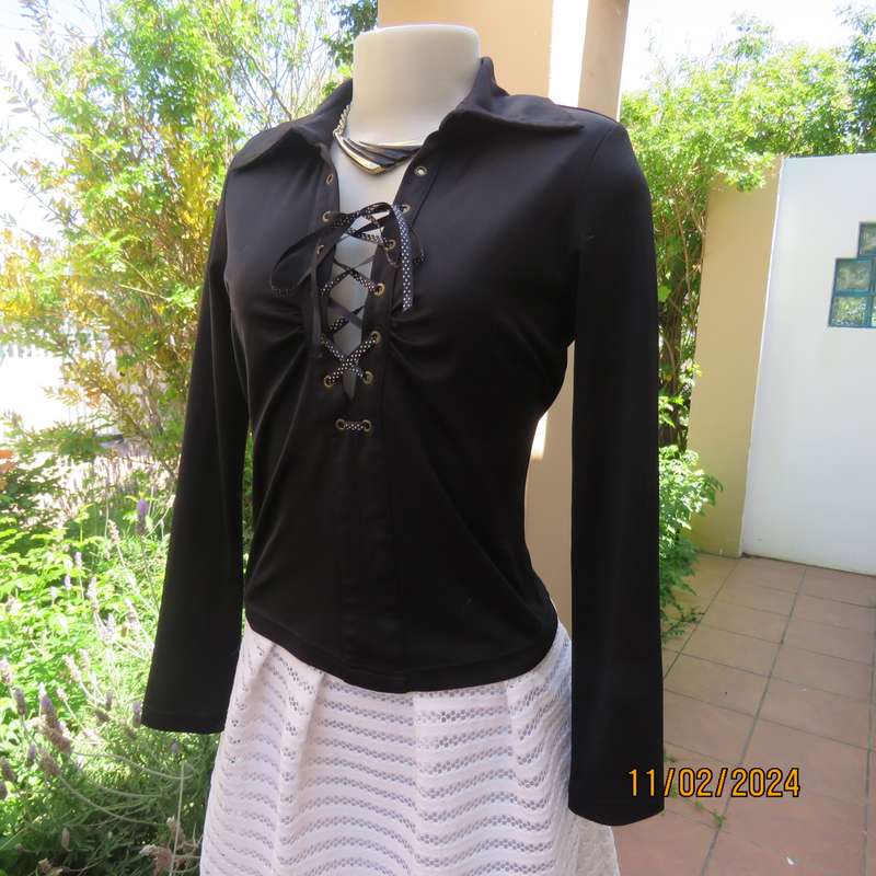 TRUWORTHS black long sleeve stretch polyester size 32 top. With braiding on the front.As new