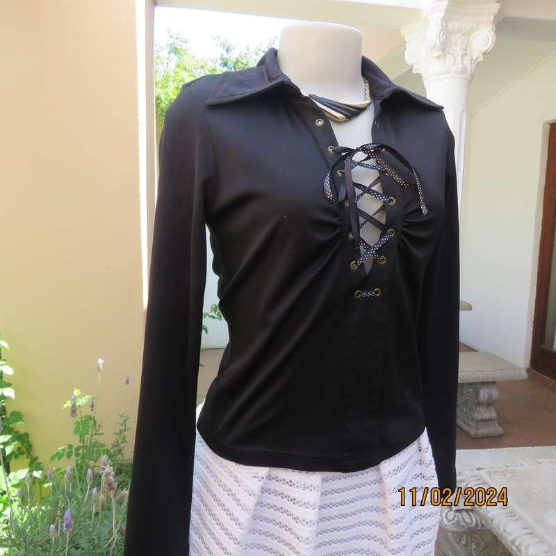 TRUWORTHS black long sleeve stretch polyester size 32 top. With braiding on the front.As new