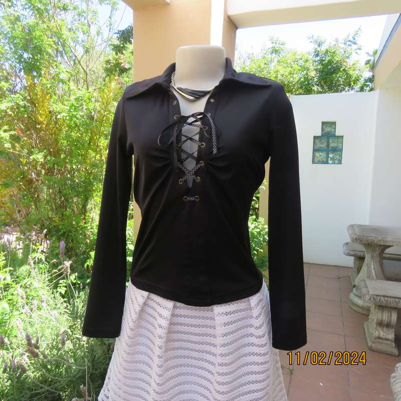 TRUWORTHS black long sleeve stretch polyester size 32 top. With braiding on the front.As new