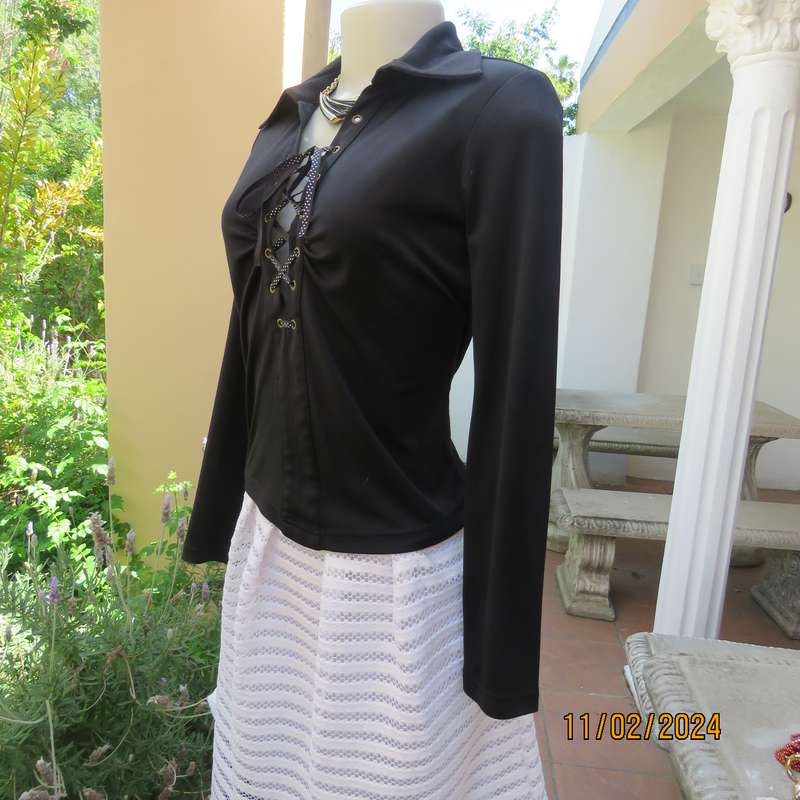 TRUWORTHS black long sleeve stretch polyester size 32 top. With braiding on the front.As new