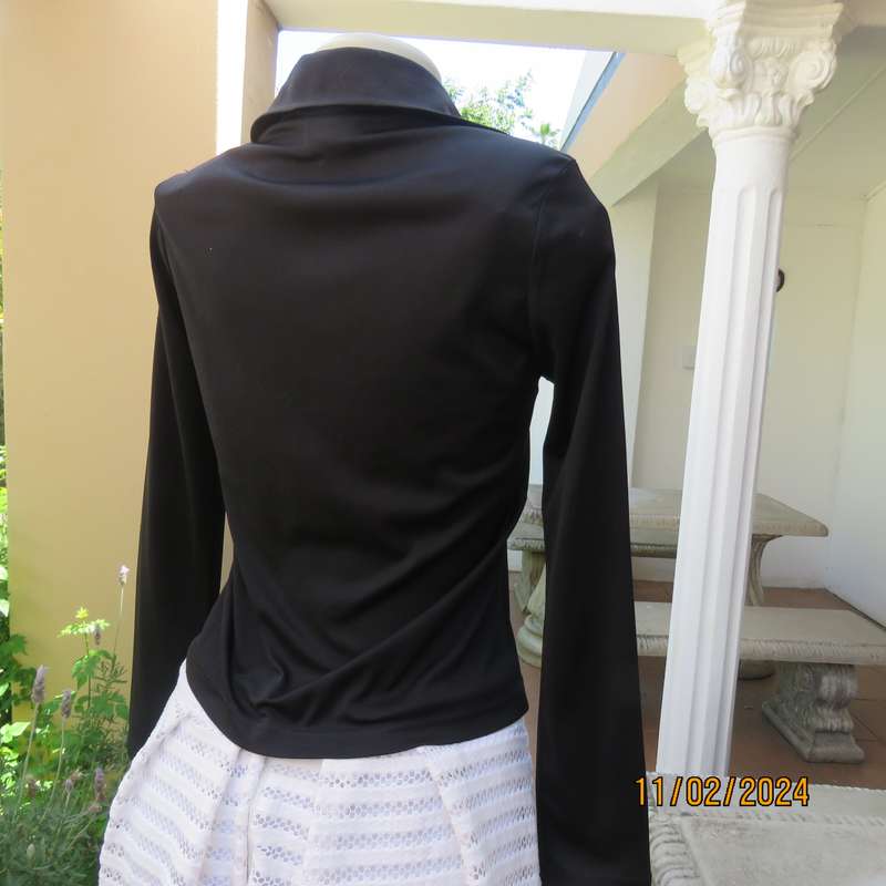 TRUWORTHS black long sleeve stretch polyester size 32 top. With braiding on the front.As new