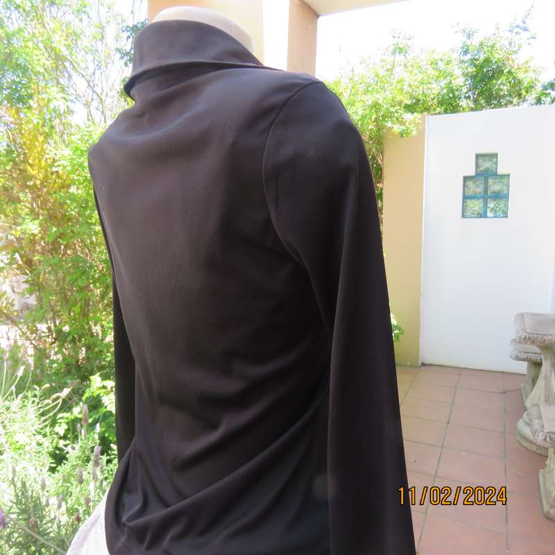 TRUWORTHS black long sleeve stretch polyester size 32 top. With braiding on the front.As new