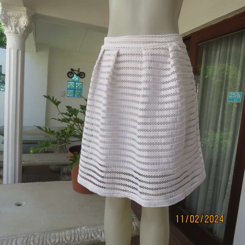 Sweet 2 layer white polyester lace knee length skirt size 36. With few knife pleats. As new cond.
