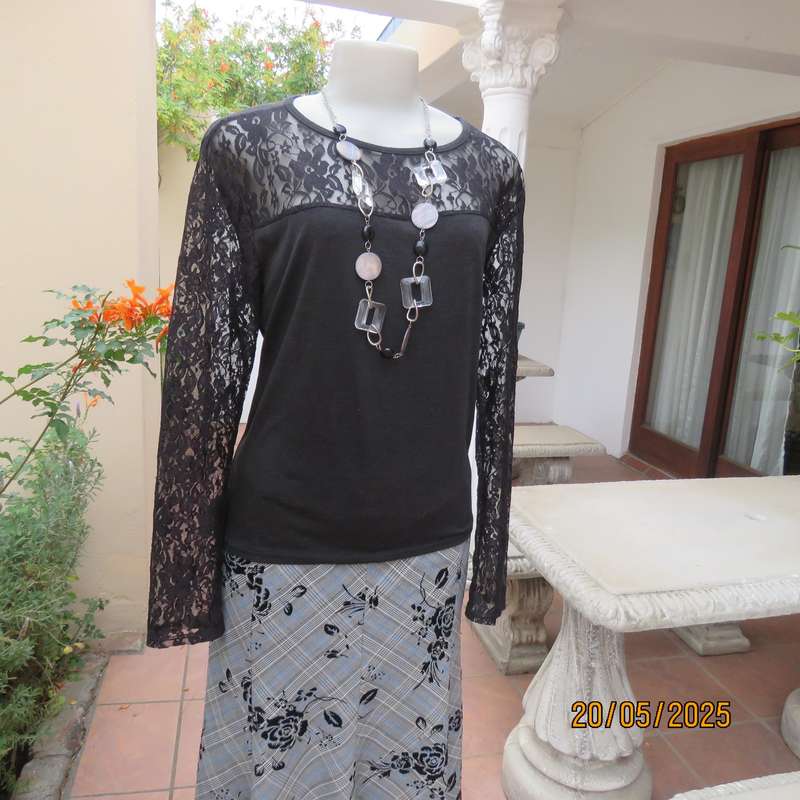 Matte black slip over top with lace front yoke and long sleeve size 42.